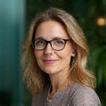 Professional headshot of Dr. Elara Vance, Founder & Chief Astronomer at Terra Gardens.